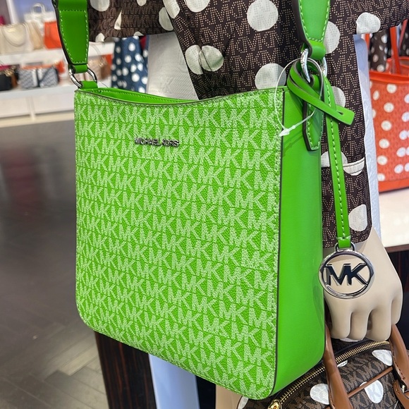 Michael Kors Handbags - Michael Kors Jet Set Signature Logo SM NS XBODY Messenger Bag
Jungle Green